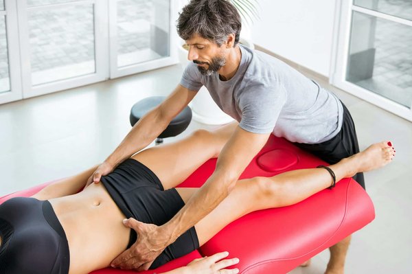 How do you properly align the headlights of a British vintage car to meet UK road regulations?